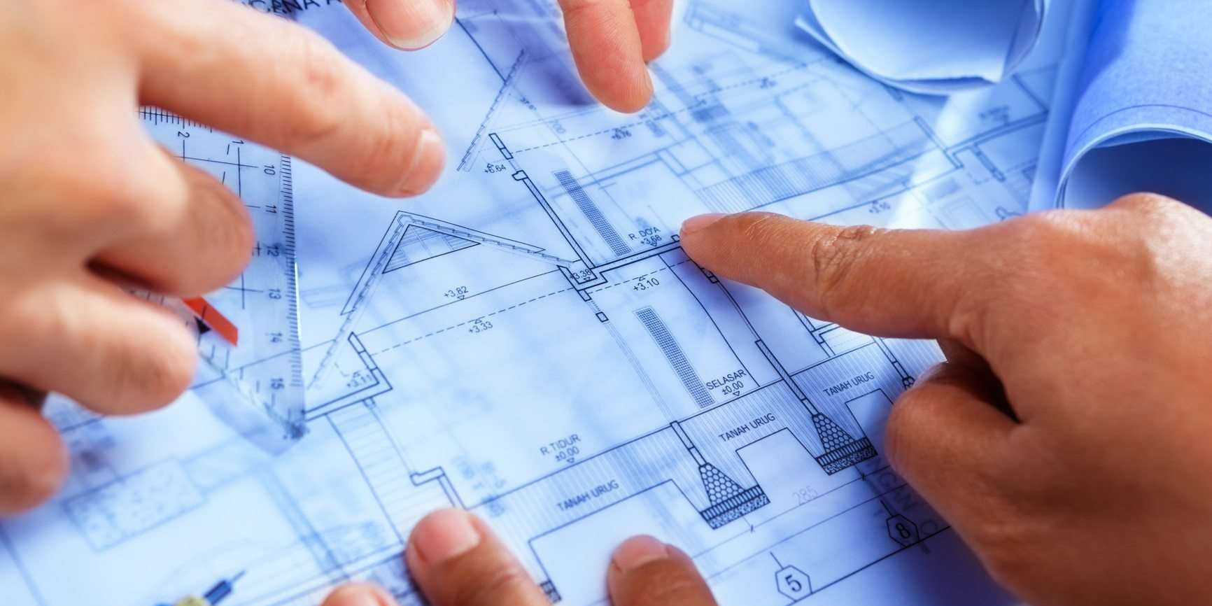 Hand of several discussing about the architect blueprint plan Mechanical and Electrical Design